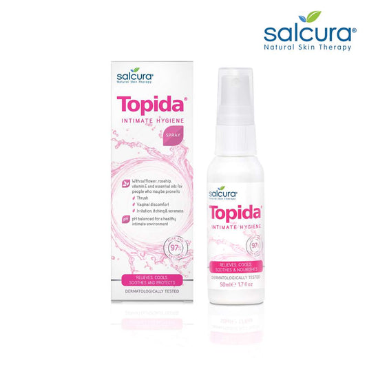 a book is shown with a pink toothbrush