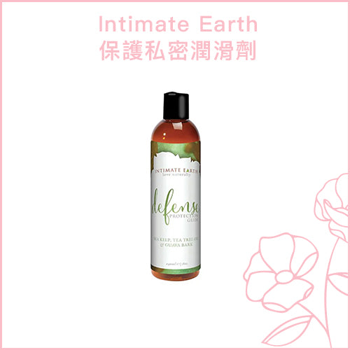 a bottle of wine sitting next to a bottle