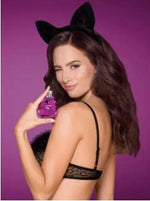 a woman in a bikini top on a pink dress