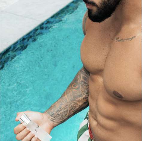 a close up of a person holding a cell phone