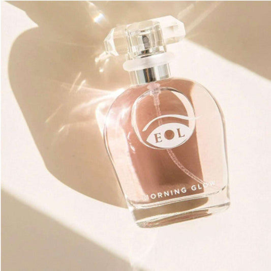 a bottle of water is in a glass