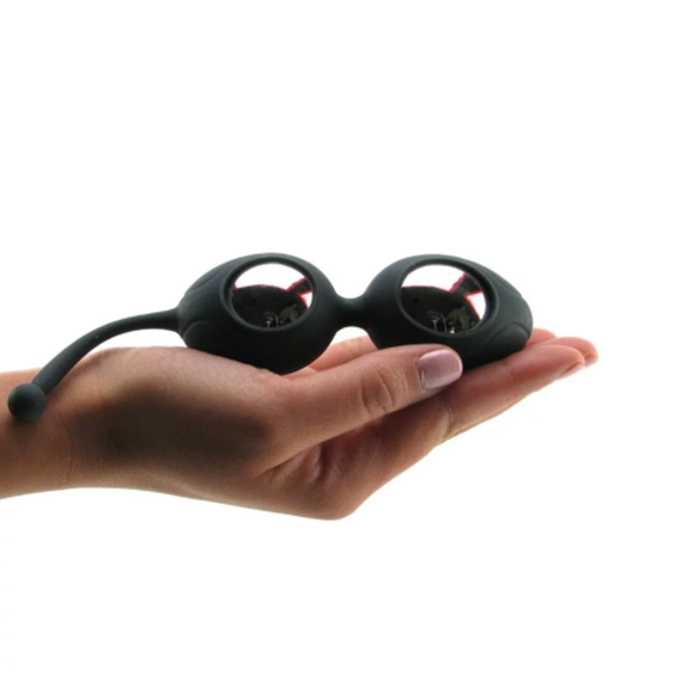 a person holding a remote control in their hand