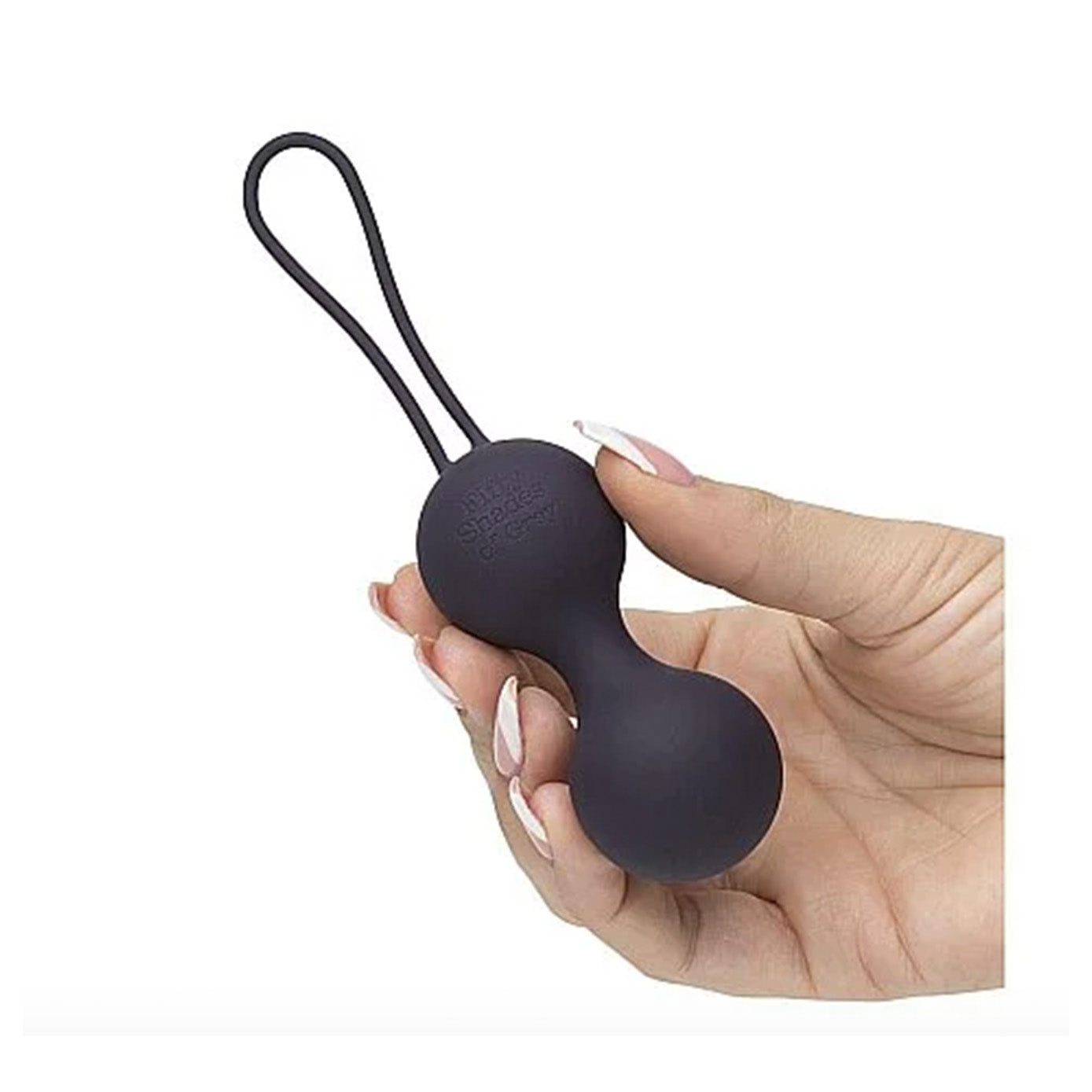 a person holding a pair of black scissors