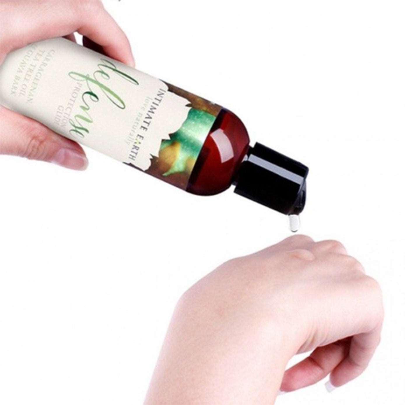 a close up of a person holding a bottle of wine