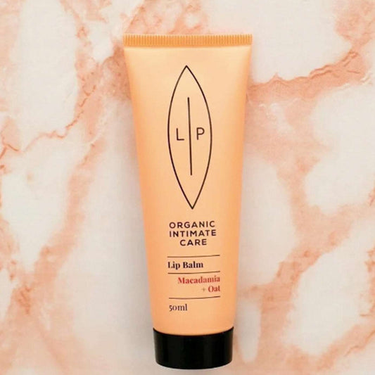 a close up of a cell phone on a white surface