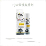 a bottle of <unk> and a cell phone