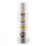 a bottle of alcohol sitting next to a bottle