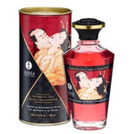 a red and white fire hydrant sitting next to a jar