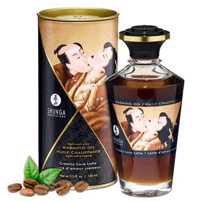 a couple of glass vases sitting next to each other