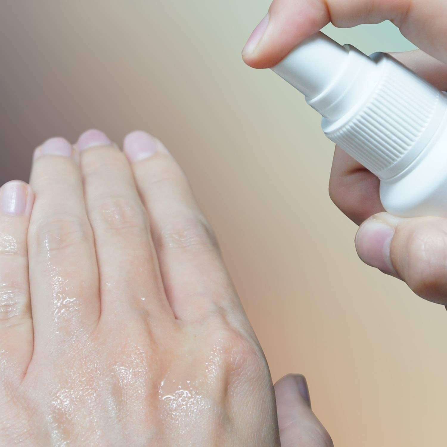 a close up of a person holding a white object 