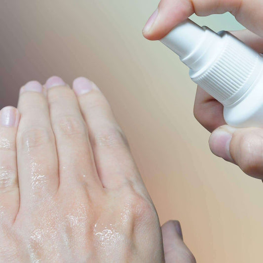 a close up of a person holding a white object 