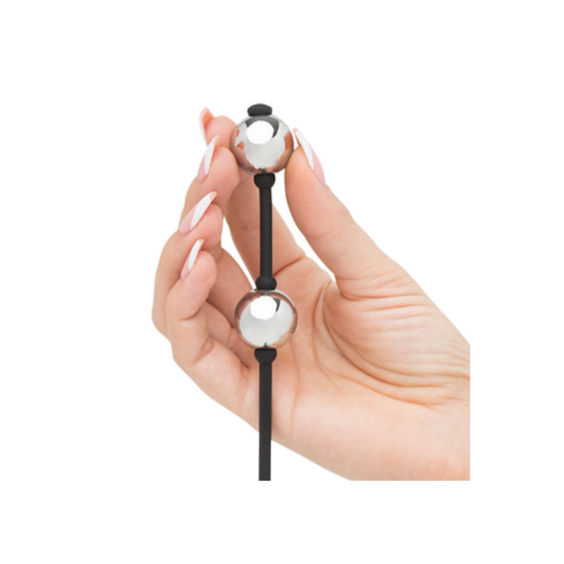 a person is holding a pair of scissors 