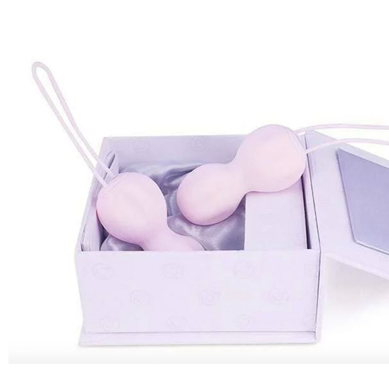 a close up of a box with a pair of shoes on it 
