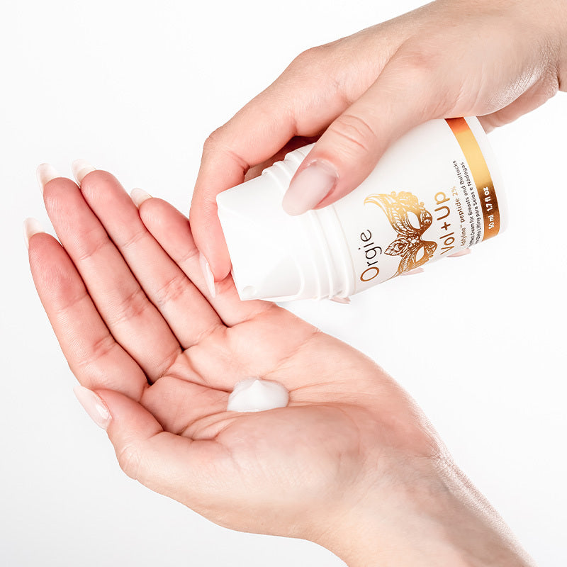 a close up of a person holding a remote 